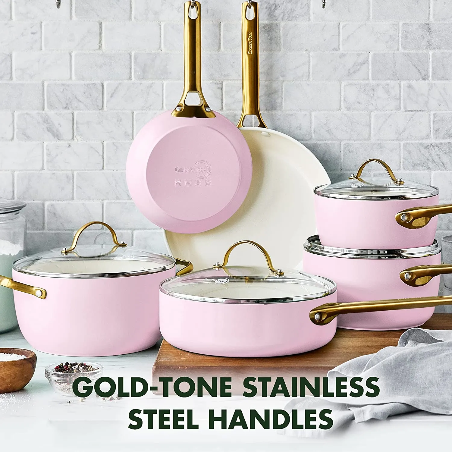 Upgrade your kitchen cookware with this pink ten-piece pot and pans set with gold handles.